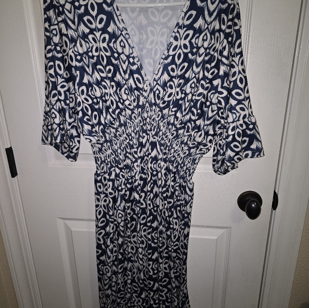 Black and White Midi Dress with V-Neck and Flutter Sleeves